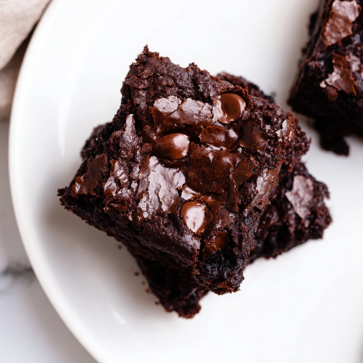 A close-up of fudgy, homemade chocolate brownie mix ready to bake, promising rich, decadent treats.
