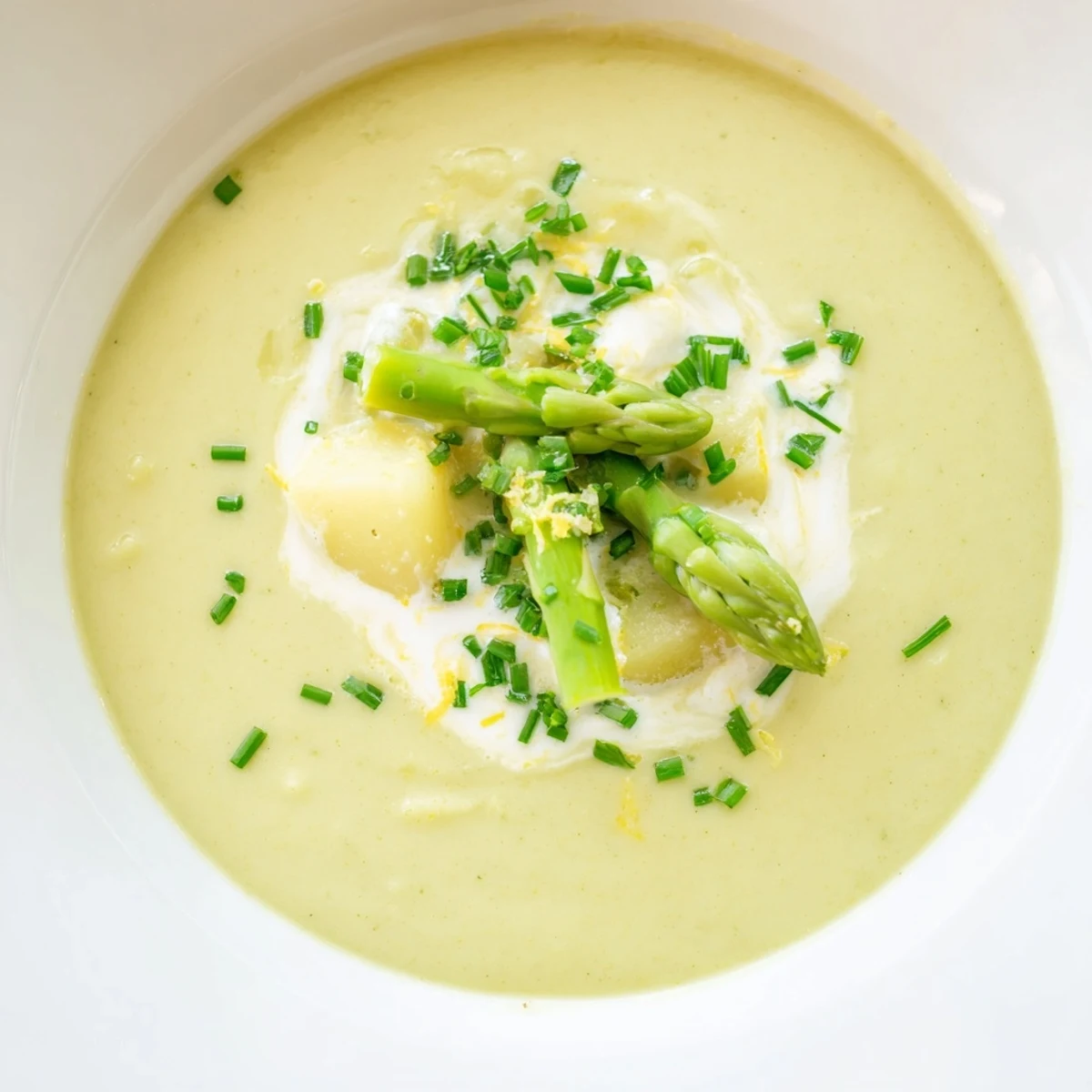 Enjoy a taste of this velvety creamy asparagus soup, perfect with crusty bread and a squeeze of fresh lemon.