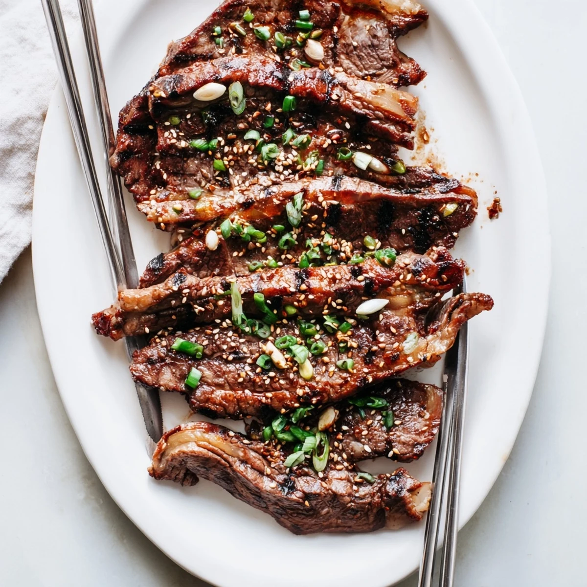 Golden grilled Korean galbi ribs glistening with sweet soy sesame marinade and charred edges