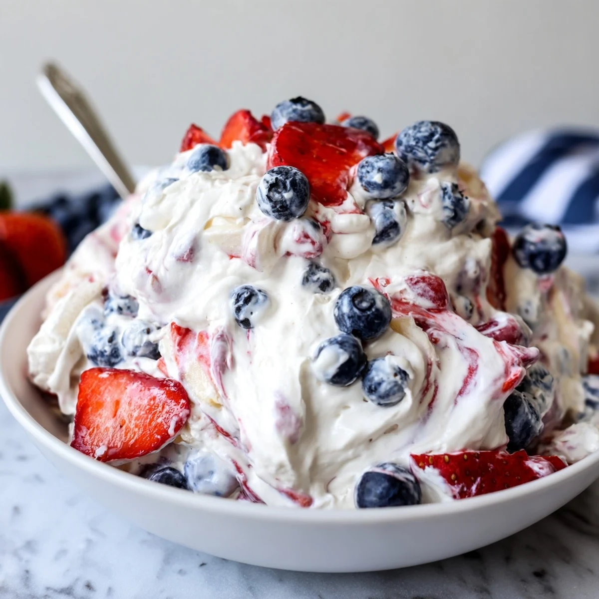 Patriotic Red White And Blue Cheesecake Salad: creamy, tangy, studded with fresh blueberries